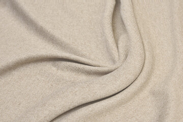 matte cream soft fabric background. smooth elegant luxury cloth textured pattern.