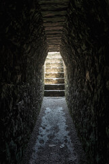 Wall Mural - Dark tomb tunnel in the palace at the archealogical site of Palenque, Chiapas, Mexico