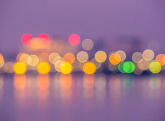 Blurred bokeh lights background from cars in traffic