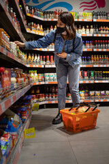 Wall Mural - woman do grocery shopping checking list on the phone