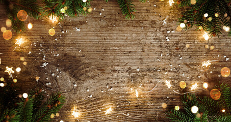Wall Mural - merry christmas frame made of christmas decorations, fir branches, spruce, lights garland, snowflake