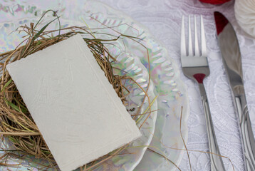 Traditional east european christmas eve wafer on plate with hay