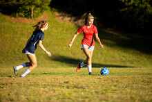 Young Girls Playing Soccer Scrimmage Game