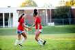 © B. Alyssa Trofort/Creative Flame - Teen girls celebrating after successful goal