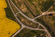 Brassica napus rapsis view look from above drone shot aerial rapeseed field yellow patches fields Latvia traffic intersection circular summer 