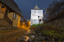 Taylor Tower, By Night, In The Famous Medieval Town Of Transylvania, Sighisoara, Romania