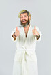 © be free - Hygiene and spa. Man in bathrobe in bathroom. Spa resort. Hotel apartments. Bearded guy wearing white bathrobe. Mature man wear bathrobe relaxing at spa. Take steps to improve your sleep habits