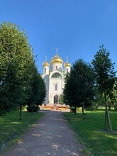 Beautiful White Orthodox Church With Golden Cupolas