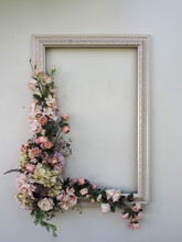 Photo Frame With Flower Patterns On The Wall