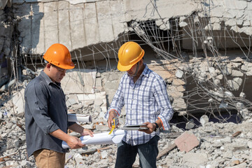 Wall Mural - Demolition control supervisor and contractor discussing on demolish building.