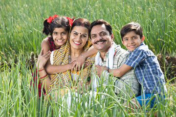 Wall Mural - Rural family of farmer on agriculture field