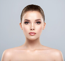 Front Portrait Of A White Young Woman With Beauty Face - Isolated. Skin Care Concept.
