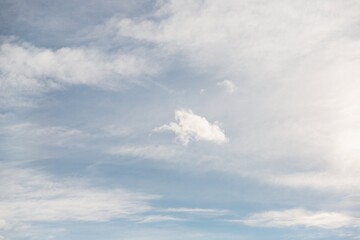 Wall Mural - Cirrocumulus clouds in the pale blue sky background