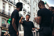 © Victor Torres/ADDICTIVE STOCK - Happy black race friends hanging out in the city in a summer day.