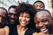 © Victor Torres/ADDICTIVE STOCK - Group of black race friends taking a selfie