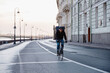 © Alexandr Yarovikov/Stocksy - Courier on a bicycle during coronavirus