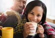 © JGI/Jamie Grill/Blend Images - Portrait of happy couple drinking coffee