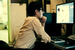 © Aliyev Alexei Sergeevich/Blend Images - Mari man using computer at desk