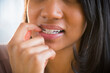 © JGI/Jamie Grill/Blend Images - Mixed race woman biting her nail
