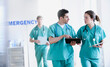© JGI/Tom Grill/Blend Images - Doctors talking in hospital emergency room