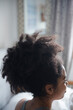 © JGI/Jamie Grill/Blend Images - Curly hair of African American woman