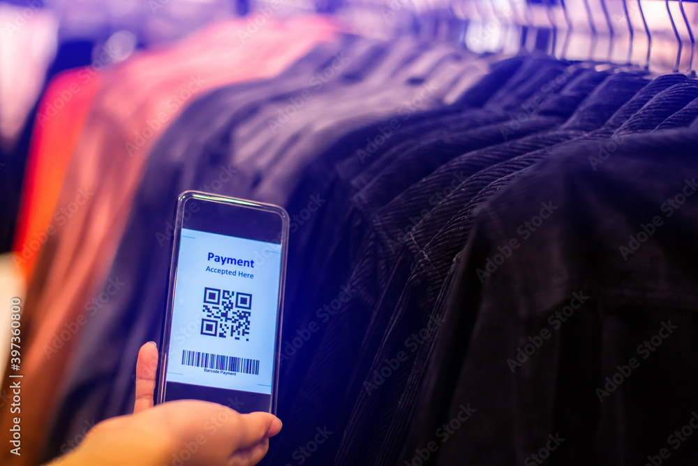 Selective focus to payment QR code tag on smartphone with blurry many ...