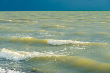 Wall Mural - sea and blue dramatic sky. tide at sea during blue twilight in cloudy weather