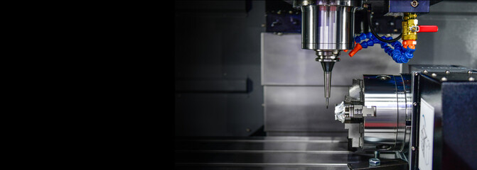 Wall Mural - the 5-axis cnc mills machines for design configuration that utilizes a swivel head machine table and
