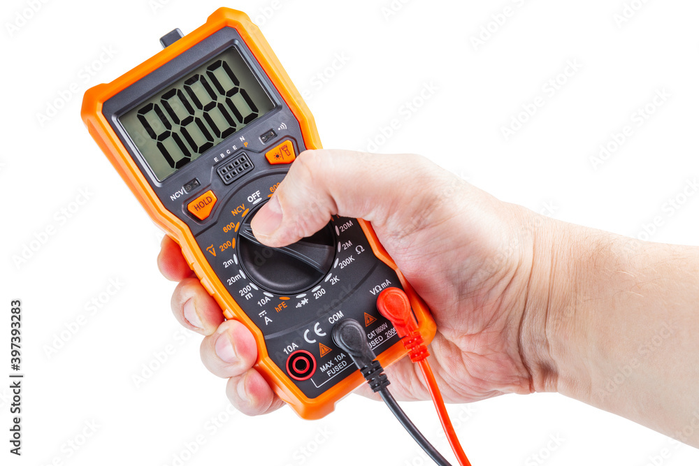 digit 8888 on lcd screen of digital electrical multimeter in right hand ...