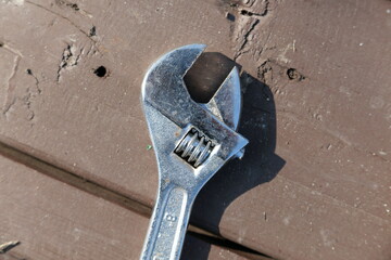 wrench on a metal background