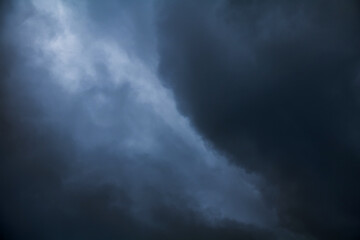 Wall Mural - Dark blue Gloomy sky with stormy clouds