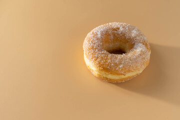 Donuts are made from flour like a cake with holes in the center and various flavors.