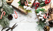 © Olena Rudo - Christmas or winter composition. Frame made of  decorations on white wooden background.