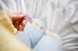 © Anna Ritter - Woman looking on positive pregancy test