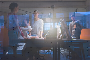 Wall Mural - Meeting of co-workers and planning next steps of work. Young business group in discussion in their office. Startup people working in office.