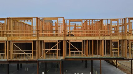 Canvas Print - Beams the walls frame home under construction residential house in American