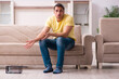 © Elnur - Young man and mousetrap at home