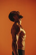 © Jacob Lund - Side view portrait of muscular athlete shouting