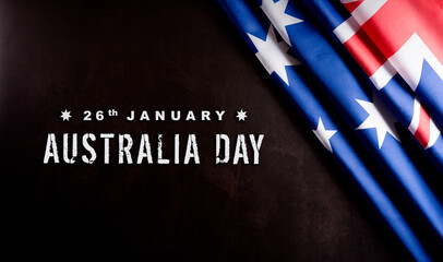 Wall Mural - Australia day concept. Australian flag against dark stone background. 26 January.