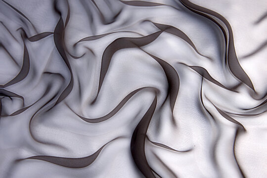 Wall Mural -  - Abstract brown color silk chiffon fabric texture. A mockup of silk tissue as background at the artistic layout.