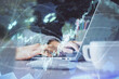 © peshkova - Double exposure of woman hands typing on computer and forex chart hologram drawing. Stock market invest concept.
