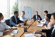 © Prostock-studio - Multiracial Business Team Having Corporate Meeting Sitting In Modern Office