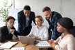 © Prostock-studio - Multiethnic Business Team Working On Laptop Together Sitting In Office