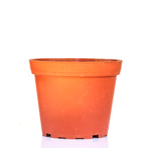 Plastic Round Empty Flower Pot Of Brown Color On White Background.