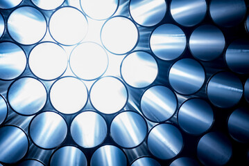 Wall Mural - Abstract background of steel pipes stacked on a pallet