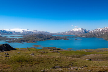 Wall Mural - Blue mountain lake in the fjell in north Norway