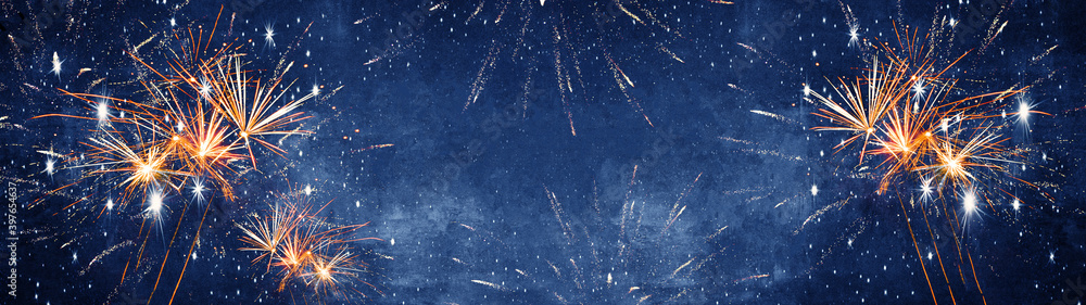 Silvester background banner panorama long- firework on rustic dark blue night sky texture
 - obrazy, fototapety, plakaty 