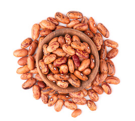 Beans in wooden bowl, isolated on white background. Top view.