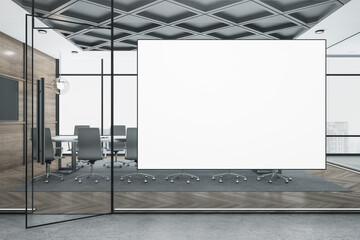 Contemporary conference room with blank banner on wall.