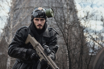 Wall Mural - Post apocalypse soldier with a rifle concept.